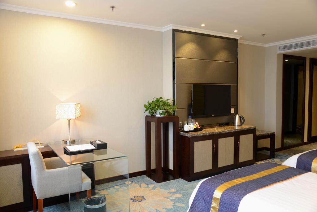 Best Western Hotel Yantai Rom bilde
